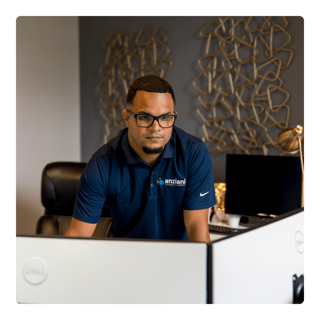 Junior working on dual monitors